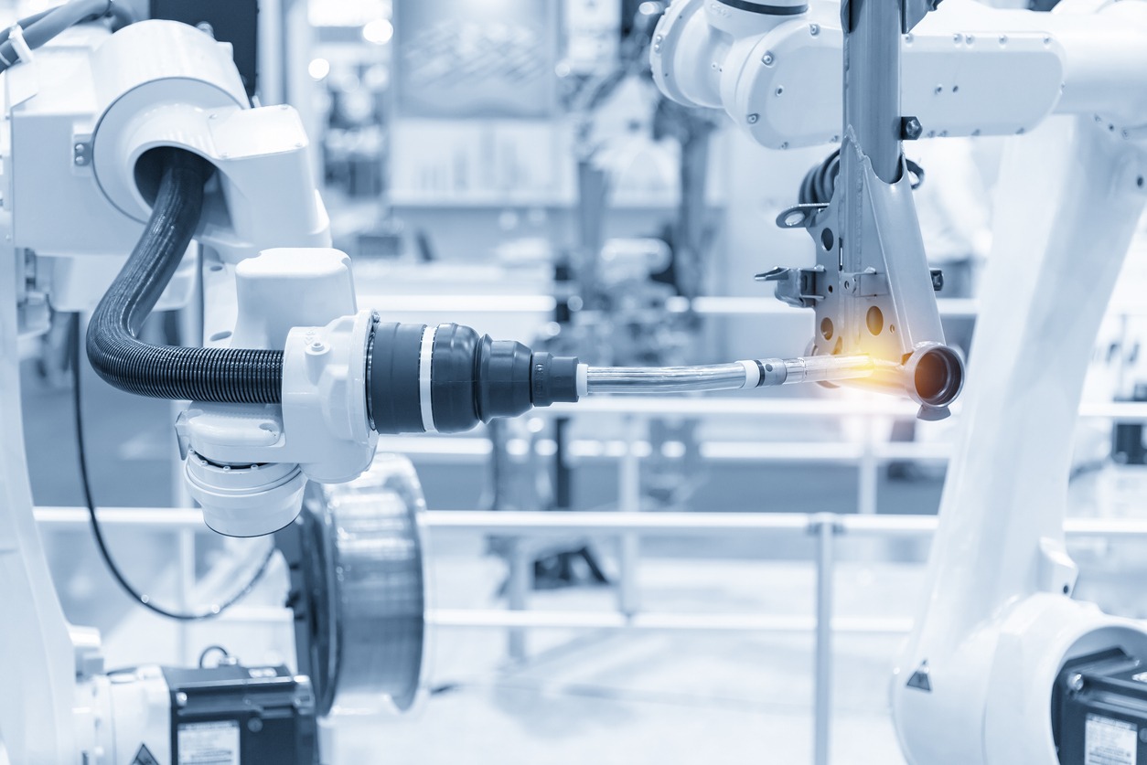 The 格林斯比 arm welding the automotive parts.
