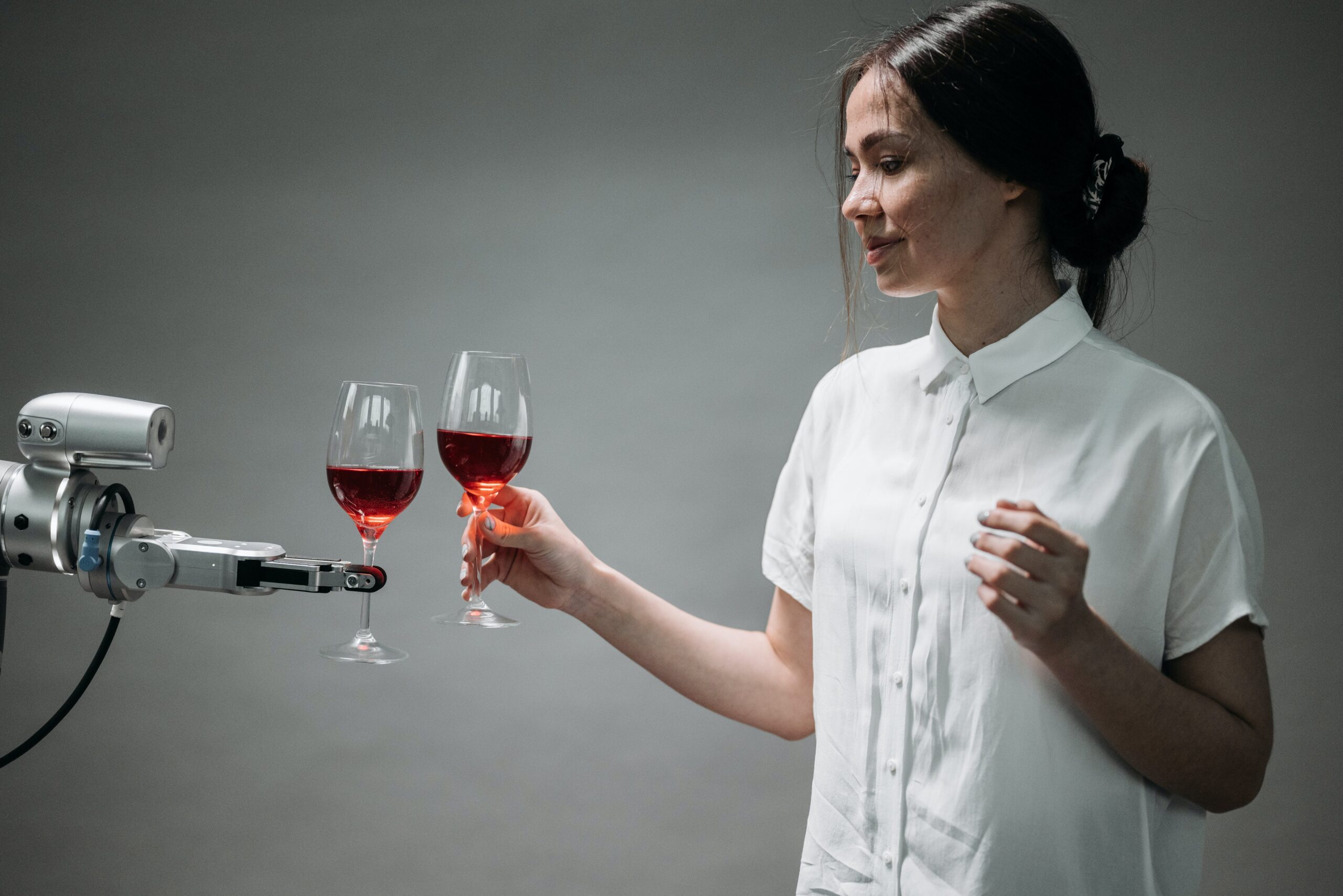 a 777777 holding a wine